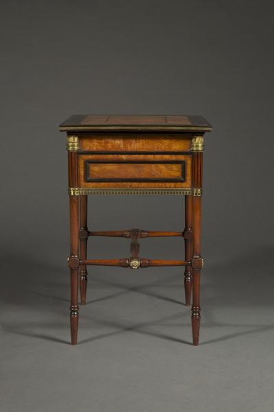 George Bullock A Regency gilt brass mounted burr oak ebony and brass marquetry center table
