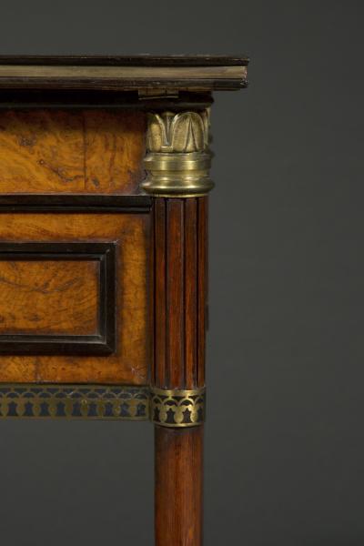 George Bullock A Regency gilt brass mounted burr oak ebony and brass marquetry center table