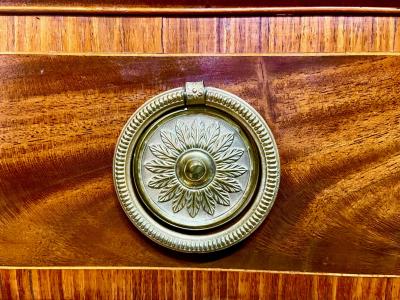 George Hepplewhite George III Mahogany and Satinwood Serpentine Commode