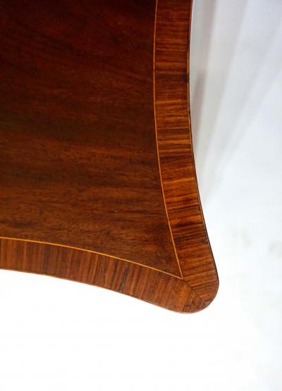 George Hepplewhite George III Mahogany and Satinwood Serpentine Commode