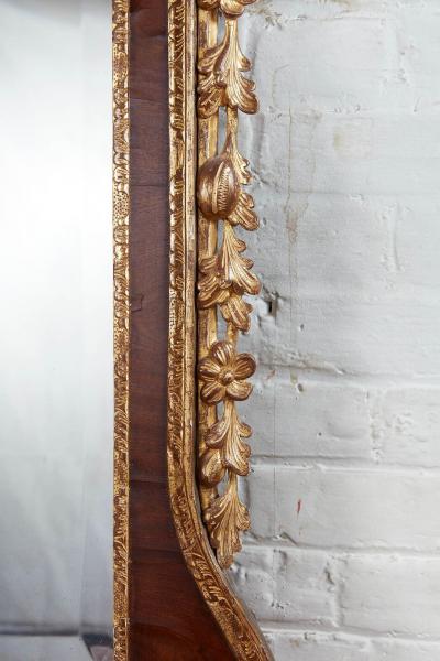 George II Walnut and Parcel Gilt Mirror