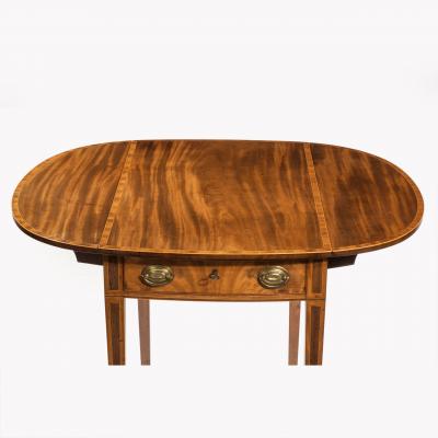 George III oval mahogany and king wood banded Pembroke table