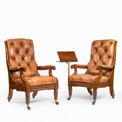 George Minter A pair of William IV adjustable mahogany library armchairs by George Minter