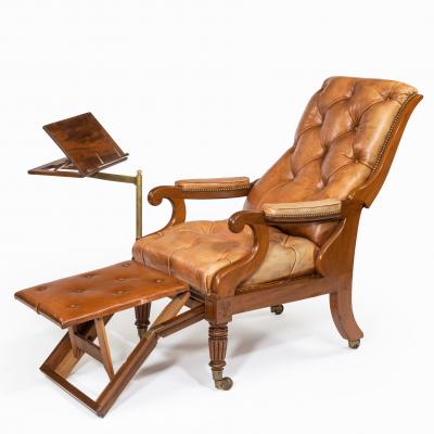 George Minter A pair of William IV adjustable mahogany library armchairs by George Minter