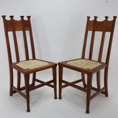George Montague Ellwood George Montague Ellwood Made by J S Henry a Pair of Matching Oak Dining Chairs