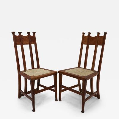 George Montague Ellwood George Montague Ellwood Made by J S Henry a Pair of Matching Oak Dining Chairs