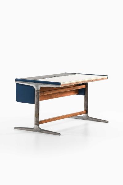 George Nelson Mid Century Desk in Aluminum Lacquer Laminate and Teak by George Nelson 1960s