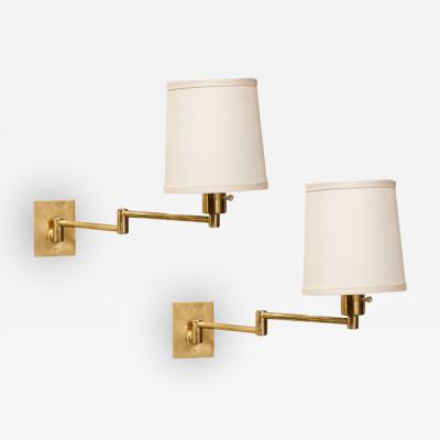 George W Hansen Pair of Mid Century Articulating Wall Sconces by George Hansen for Metarlarte