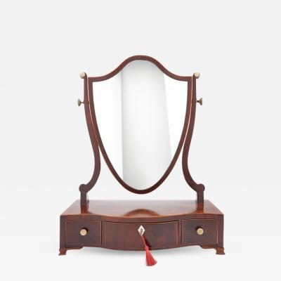 George lIl mahogany swinger shield dressing mirror on a serpentine box stand