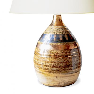 Georges Pelletier Table lamp with sandy glazing and gilded stripes by Georges Pelletier
