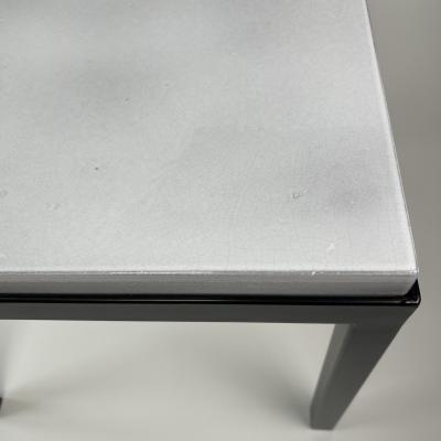 Gerard Simo n PAIR OF WHITE GLAZED LAVA STONE SIDE TABLES