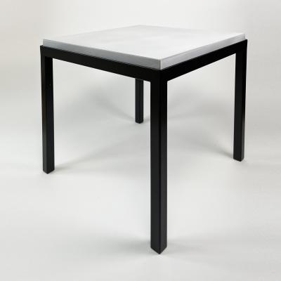 Gerard Simo n PAIR OF WHITE GLAZED LAVA STONE SIDE TABLES