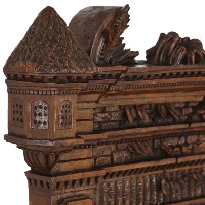 German porcelain plaque in ornate carved Black Forest frame