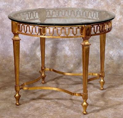 Gilbert Poillerat Gilbert Poillerat pair of gilt iron tables