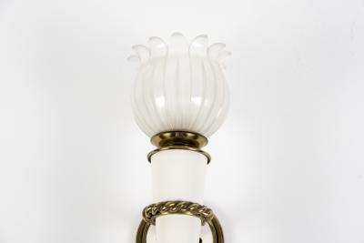 Gilbert Poillerat Pair of 1950s sconces in the style of Gilbert Poillerat