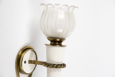 Gilbert Poillerat Pair of 1950s sconces in the style of Gilbert Poillerat