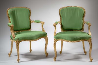 Gilded suite of six open armchairs and settee 