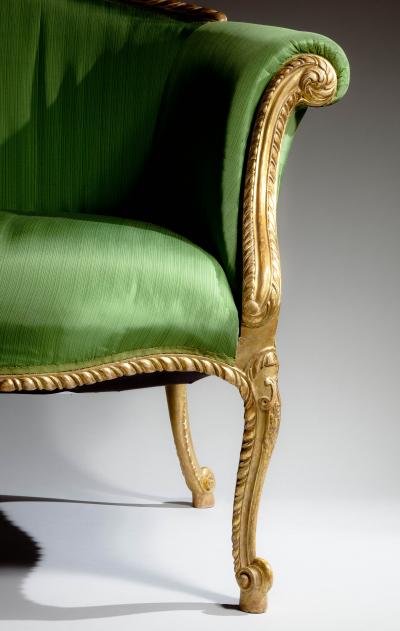 Gilded suite of six open armchairs and settee 