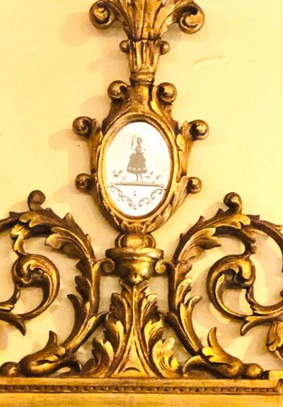 Gilt Carved Wall Console or Table Mirror with High Open Fleur de Lis Pediment