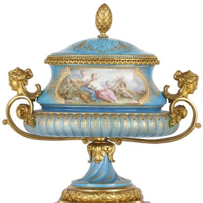 Gilt bronze and S vres style porcelain clock garniture
