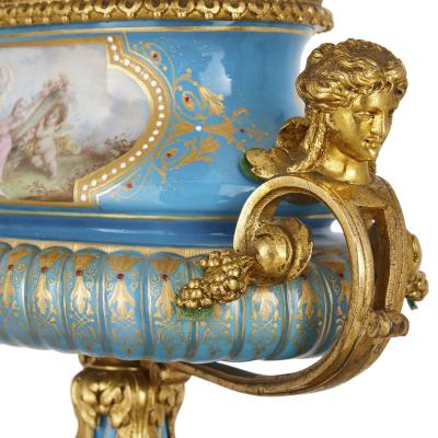 Gilt bronze and S vres style porcelain clock garniture