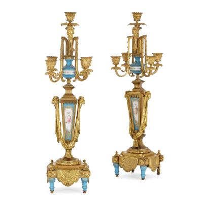 Gilt bronze and S vres style porcelain clock garniture