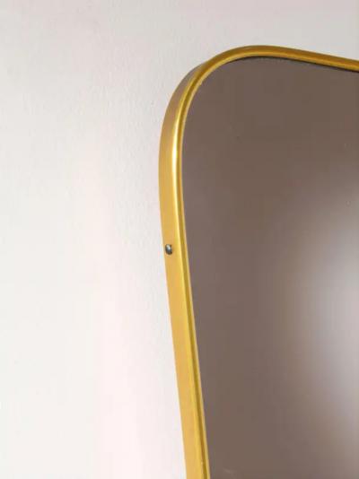 Gio Ponti A mid century Italian brass mirror in the style of Gio Ponti 1960s