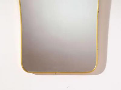 Gio Ponti A mid century Italian brass mirror in the style of Gio Ponti 1960s