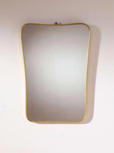 Gio Ponti A mid century Italian brass mirror in the style of Gio Ponti 1960s