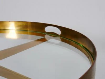 Gio Ponti Circular Gio Ponti style brass and glass table Italy c1950