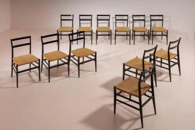 Gio Ponti Gio Ponti set of twelve Leggera chairs with hand woven rattan cane Italy 1951