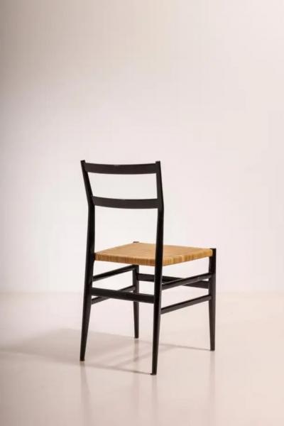 Gio Ponti Gio Ponti set of twelve Leggera chairs with hand woven rattan cane Italy 1951