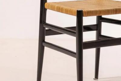 Gio Ponti Gio Ponti set of twelve Leggera chairs with hand woven rattan cane Italy 1951