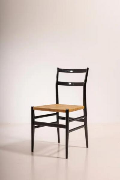 Gio Ponti Gio Ponti set of twelve Leggera chairs with hand woven rattan cane Italy 1951