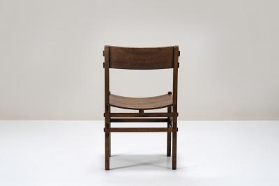 Giuseppe Rivadossi Set of Eight Rivadossi Dining Chairs with Carved Backrests in Slavonian Oak