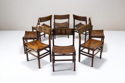 Giuseppe Rivadossi Set of Eight Rivadossi Dining Chairs with Carved Backrests in Slavonian Oak