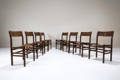 Giuseppe Rivadossi Set of Eight Rivadossi Dining Chairs with Carved Backrests in Slavonian Oak