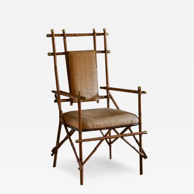 Giusto Puri Purini rattan armchair with brass details and rattan fabric cushions
