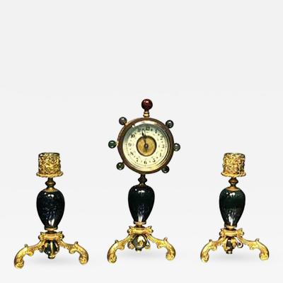 Glamorous Suite of Semiprecious Stone and Dor Bronze Clock and Candlesticks