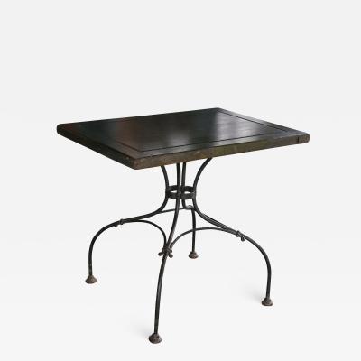 Green rectangular top table with iron legs
