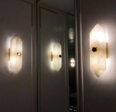 Group of Four Diamond Form Rock Crystal Sconces by Phoenix
