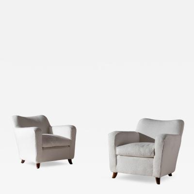 Guglielmo Ulrich A pair of Art Deco lounge chairs in the style of Guglielmo Ulrich Italy 1940s