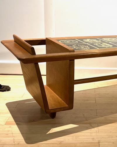 Guillerme et Chambron Guillerme et Chambron superb coffee table with magazine rack