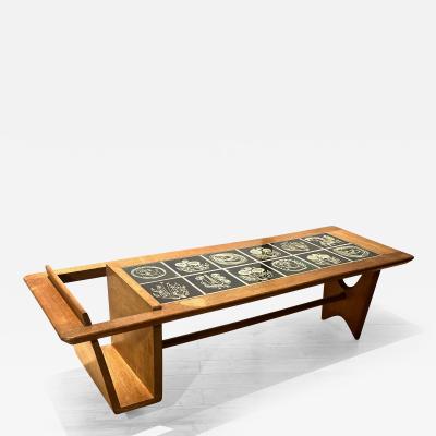 Guillerme et Chambron Guillerme et Chambron superb coffee table with magazine rack