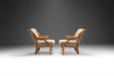Guillerme et Chambron Pair of Gr goire Lounge Chairs by Guillerme et Chambron France 1960s