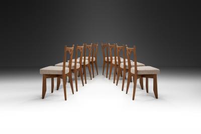 Guillerme et Chambron Set of Eight Dining Chairs by Guillerme et Chambron France 1960s