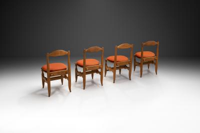 Guillerme et Chambron Set of Four Charlotte Oak Dining Chairs by Guillerme et Chambron France 1960s