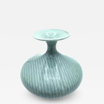 Gunnar Nylund A porcelain vase decorated in celadon glaze with wavy lines