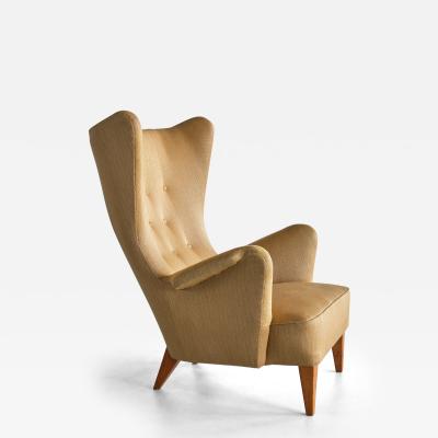 Gustav Axel Berg Gustav Axel Berg Attributed Wingback Chair in Yellow Wool and Elm Sweden 1940s