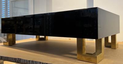Guy LeFevre Guy Lefebre pure black lacquered coffee table with gold legs